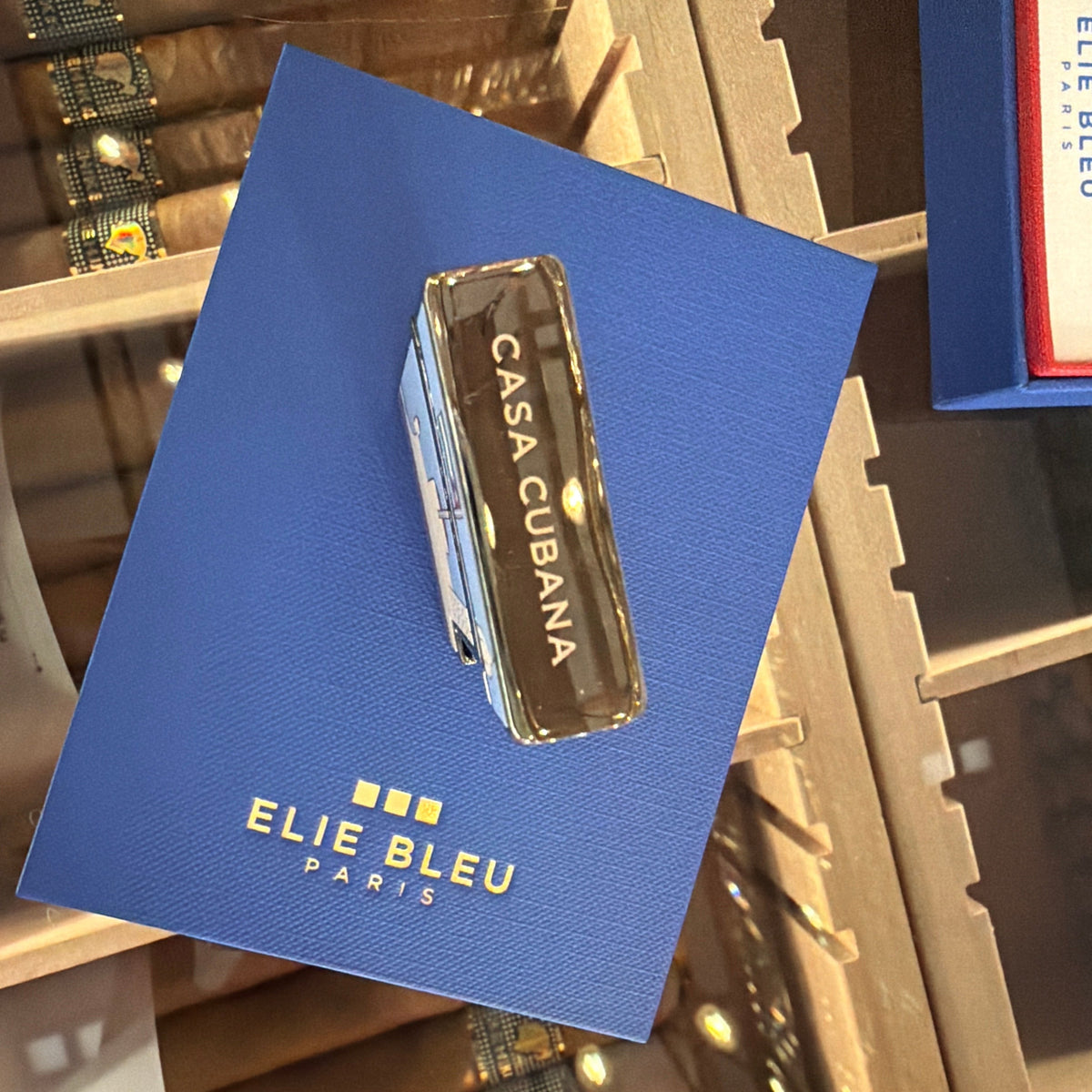 HAMILTON ELIE BLUE Casa Cubana limited edition lighter in black ion plating displayed on a blue branded box