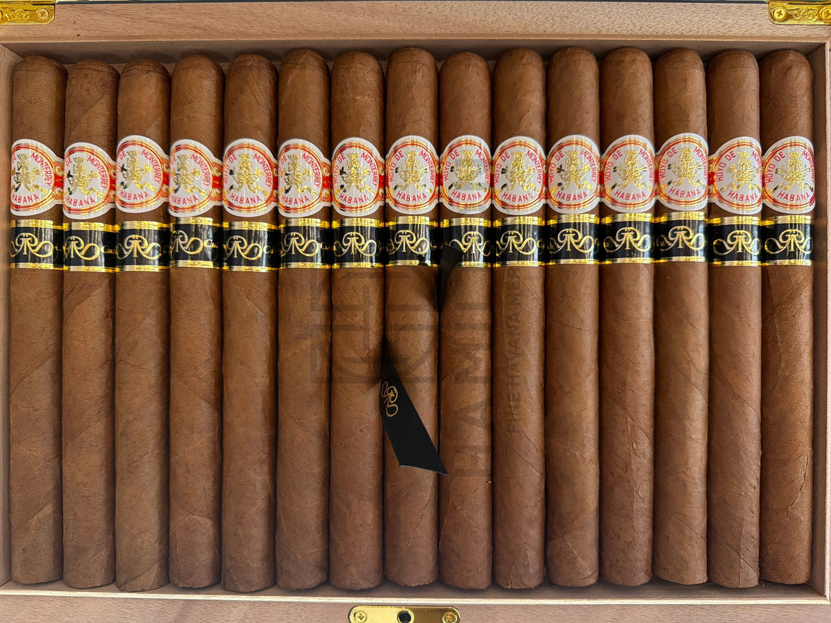 HAMILTON Hoyo de Monterrey Double Coronas Gran Reserva 2013 cigars arranged in a wooden box with gold and black bands