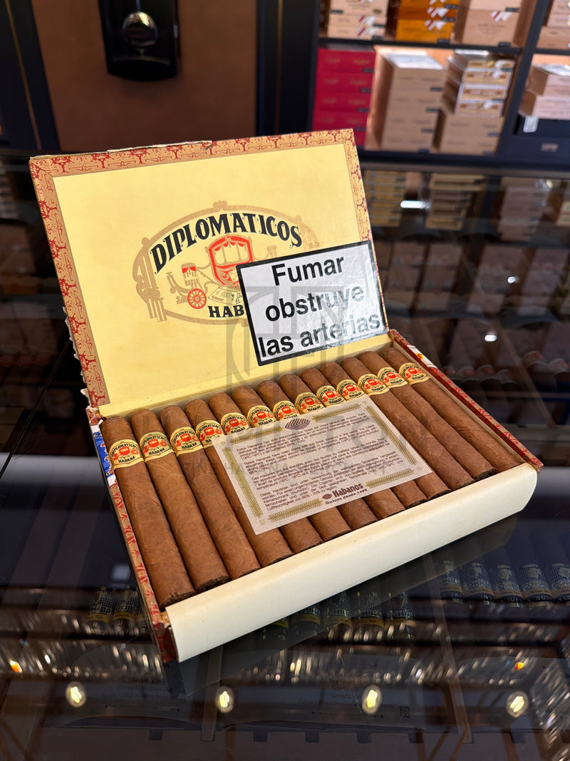 HAMILTON vintage 2002 Diplomaticos No.4 cigars in an open wooden box with a health warning label