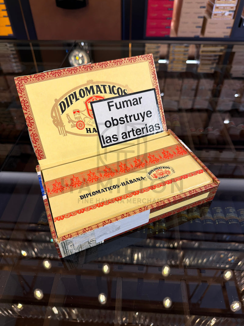 HAMILTON Diplomaticos No.5 cigar box from 2002 with ornate cream and red packaging on a glass display shelf