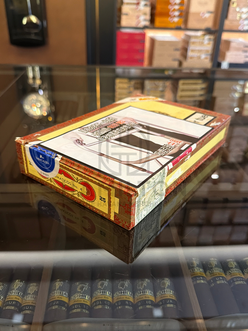 HAMILTON vintage 2002 Diplomaticos No.4 cigar box with ornate red and gold packaging on a glass display shelf