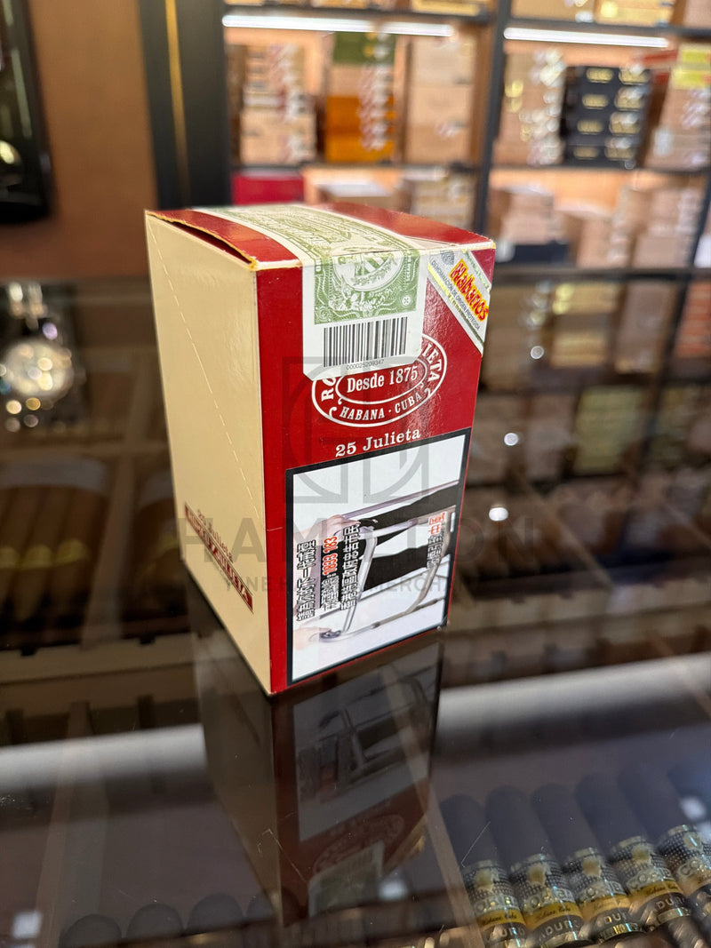 HAMILTON Romeo y Julieta 25s Julieta cigar tin box with red and cream branding on a glass display shelf
