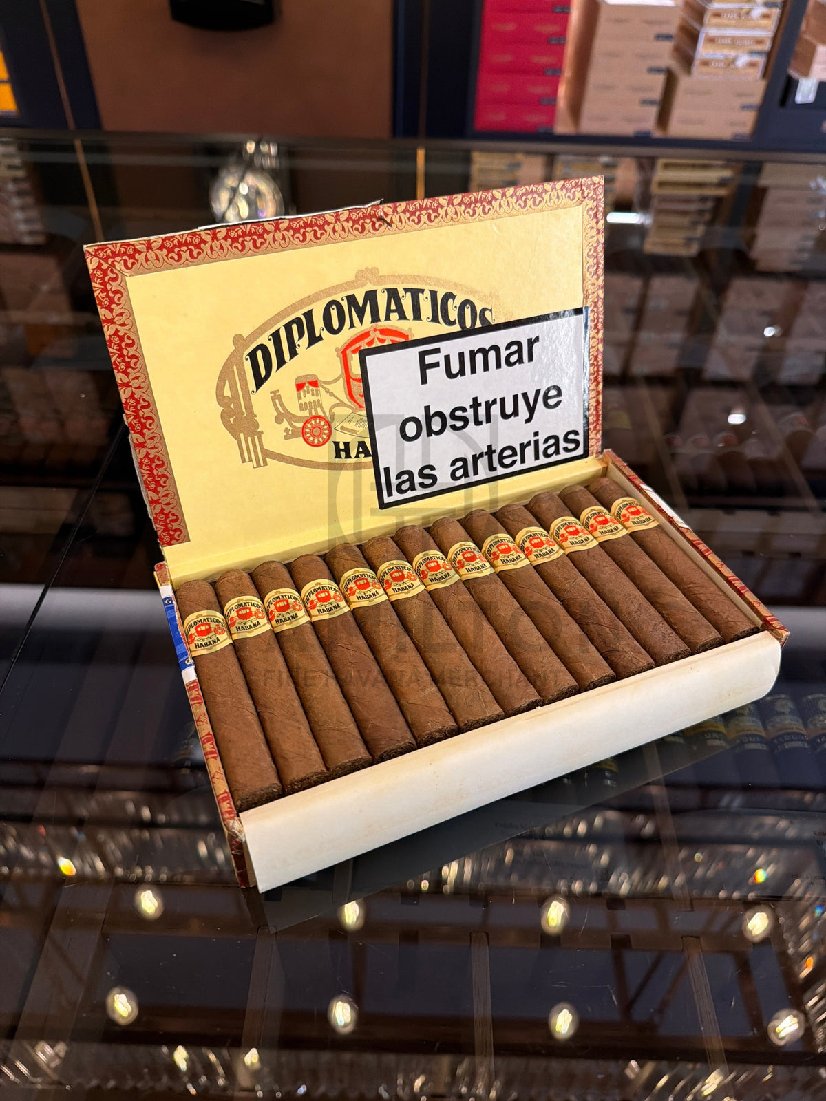 HAMILTON Diplomaticos No. 5 cigars from 2002 arranged in an open wooden box with vintage branding and health warning