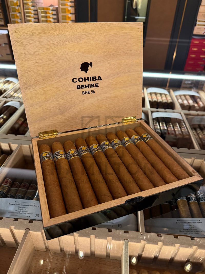 HAMILTON Cohiba Behike BHK 56 cigar box containing ten premium brown cigars with signature gold and black bands